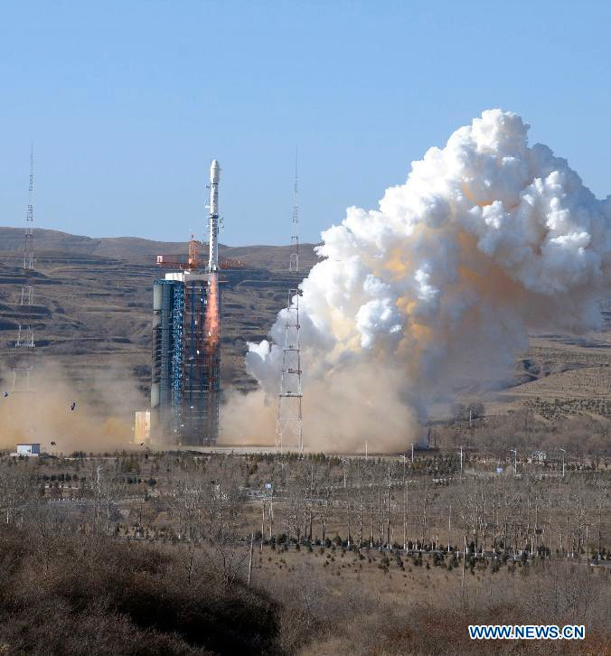 A Long March 4B rocket lifts off with the CBERS 4 Earth observation satellite